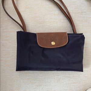 Large purple Longchamp Le Pilage Tote.
